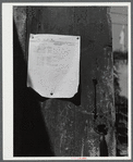 Program for the World's Fair posted on the door of the antique building. Tunbridge, Vermont.