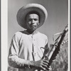 Guanica, Puerto Rico (vicinity). Farm laborer working in a sugar cane field.