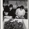 Yauco, Puerto Rico. Sorting and packing tomatoes at the Yauco cooperative tomato growers' association.