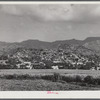Yauco, Puerto Rico. The town, with slums sprawled on the hillside.