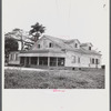 Santurce, Puerto Rico (vicinity). A house on the property which FSA (Farm Security Administration) is buying for a land and utility housing project.
