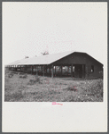 Santurce, Puerto Rico (vicinity). A barn on the property which FSA (Farm Security Administration) is buying for a land and utility housing project.