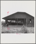 Santurce, Puerto Rico (vicinity). A barn on the property which FSA (Farm Security Administration) is buying for a land and utility housing project.