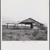 Santurce, Puerto Rico (vicinity). A barn on the property which FSA (Farm Security Administration) is buying for a land and utility housing project.