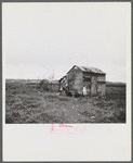 Santurce, Puerto Rico (vicinity). A house on the property which FSA (Farm Security Administration) is buying for a land and utility housing project.