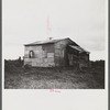 Santurce, Puerto Rico (vicinity). A house on the property which FSA (Farm Security Administration) is buying for a land and utility housing project.