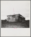 Santurce, Puerto Rico (vicinity). A house on the property which FSA (Farm Security Administration) is buying for a land and utility housing project.