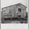 Santurce, Puerto Rico (vicinity). A house on the property which FSA (Farm Security Administration) is buying for a land and utility housing project.