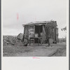 Santurce, Puerto Rico (vicinity). A house on the property which FSA (Farm Security Administration) is buying for a land and utility housing project.