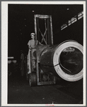 Sheffield, Alabama. Reynolds Alloys Company. Specially constructed dollies carry aluminum rolls around the plant.