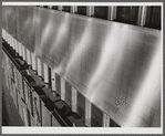 Sheffield, Alabama. Reynolds Alloys Company. Sheet of aluminum which has just been rolled from the hot mill.
