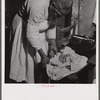 Midwife wrapping her kit to go on a call in Greene County, Georgia.
