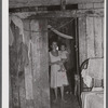 Saint Croix Island, Virgin Islands. Puerto Rican woman and her children, FSA (Farm Security Administration) borrower, living in the slum village of "Barren Spot".
