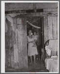 Saint Croix Island, Virgin Islands. Puerto Rican woman and her children, FSA (Farm Security Administration) borrower, living in the slum village of "Barren Spot".