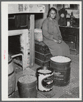 The mother of Mr. Edgar Jones, FSA (Farm Security Administration) client with peanuts that are being stored for the winter. Woodville, Greene County, Georgia.