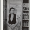 Mrs. Ira C. Brown with her canned goods. FSA (Farm Security Administration) clients. Her husband built the cupboard. Union Point, Greene County, Georgia.