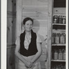 Mrs. Ira C. Brown with her canned goods. FSA (Farm Security Administration) clients. Her husband built the cupboard. Union Point, Greene County, Georgia.