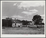 One of the new houses being built for FSA (Farm Security Administration) to replace some of the old, like the one at the left. Near Carey Station, Greene County, Georgia.