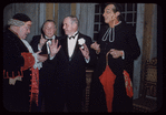 Salvatore Baccaloni, conductor Désiré Defrère, unidentified man, and Jerome Hines during a Metropolitan Opera tour of Il barbiere di Siviglia in Boston