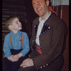 Leslie Chabay in costume for Carmen at the Metropolitan Opera, with his son