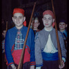 Chorus members in costume for Carmen at the Metropolitan Opera