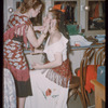 Bidú Sayão applying makeup to Carmen Gracia during a Metropolitan Opera tour of Carmen