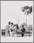 James Baldwin with sailors in front of mosque