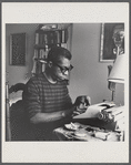 James Baldwin at typewriter