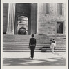 James Baldwin walking toward palace steps