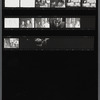 Contact sheet of James Baldwin with others at restaurant