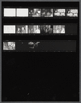 Contact sheet of James Baldwin with others at restaurant