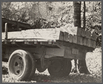 Railroad ties, handhewn. Principal use to which timber is put in this county, Brown County, Indiana.
