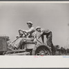 Luke Weldon, small farmer, and his son using ancient Buick (transformed by cutting down the chassis) as improvised tractor. Automobile bought in second hand car lot. Cost fifteen dollars. New Bridgetown, New Jersey.