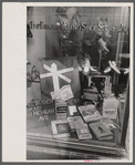 Books on display in show store window, 47th Street, Chicago, Illinois.