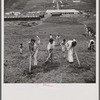 Young sons of resettlers in an outdoor class of the agricultural school. La Plata project. Puerto Rico.