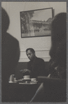 James Baldwin seated and in discussion