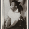 James Baldwin sitting in profile