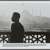 James Baldwin in silhouette againsts mosques in Turkey