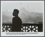 James Baldwin in silhouette againsts mosques in Turkey