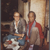 James Baldwin seated with Jacques Gomot