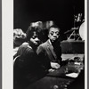 James Baldwin with woman at jazz club