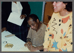 James Baldwin signing post-lecture