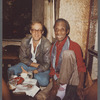James Baldwin seated with Jacques Gomot