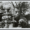 James Baldwin stirring tea