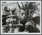James Baldwin stirring tea