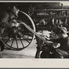 Rehabilitation client looking over farm implements, Jackson, Ohio