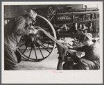 Rehabilitation client looking over farm implements, Jackson, Ohio