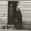Resettlement Administration representative at door of rehabilitation client's house, Jackson County, Ohio.