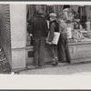 Newsboys admiring sporting goods, Jackson, Ohio.