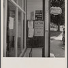 Signs outside general store. Lincoln, Vermont.